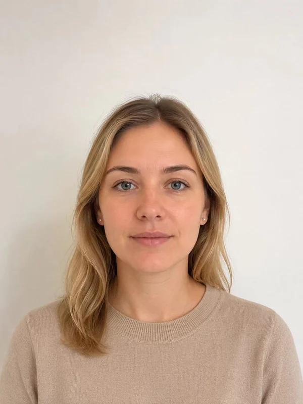Good starting photo for a passport photo with even lighting and proper camera distance